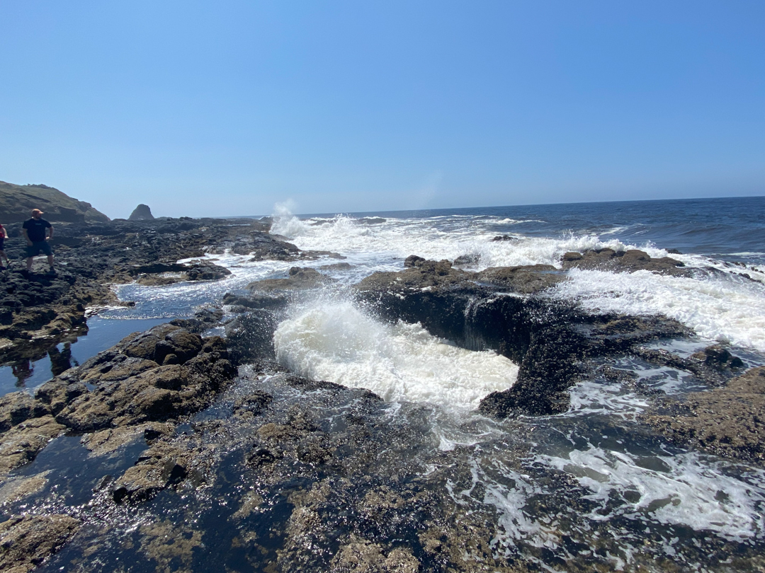 ocean waves hitting rocks