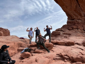 adventures for all group posing on rocks in utah