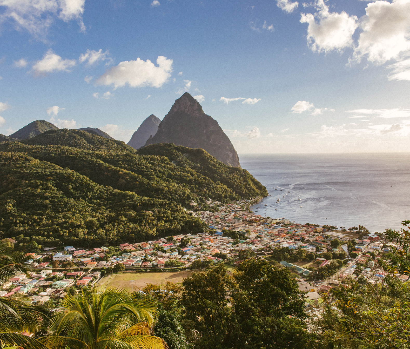 view overlooking a town in st lucia by the ocean